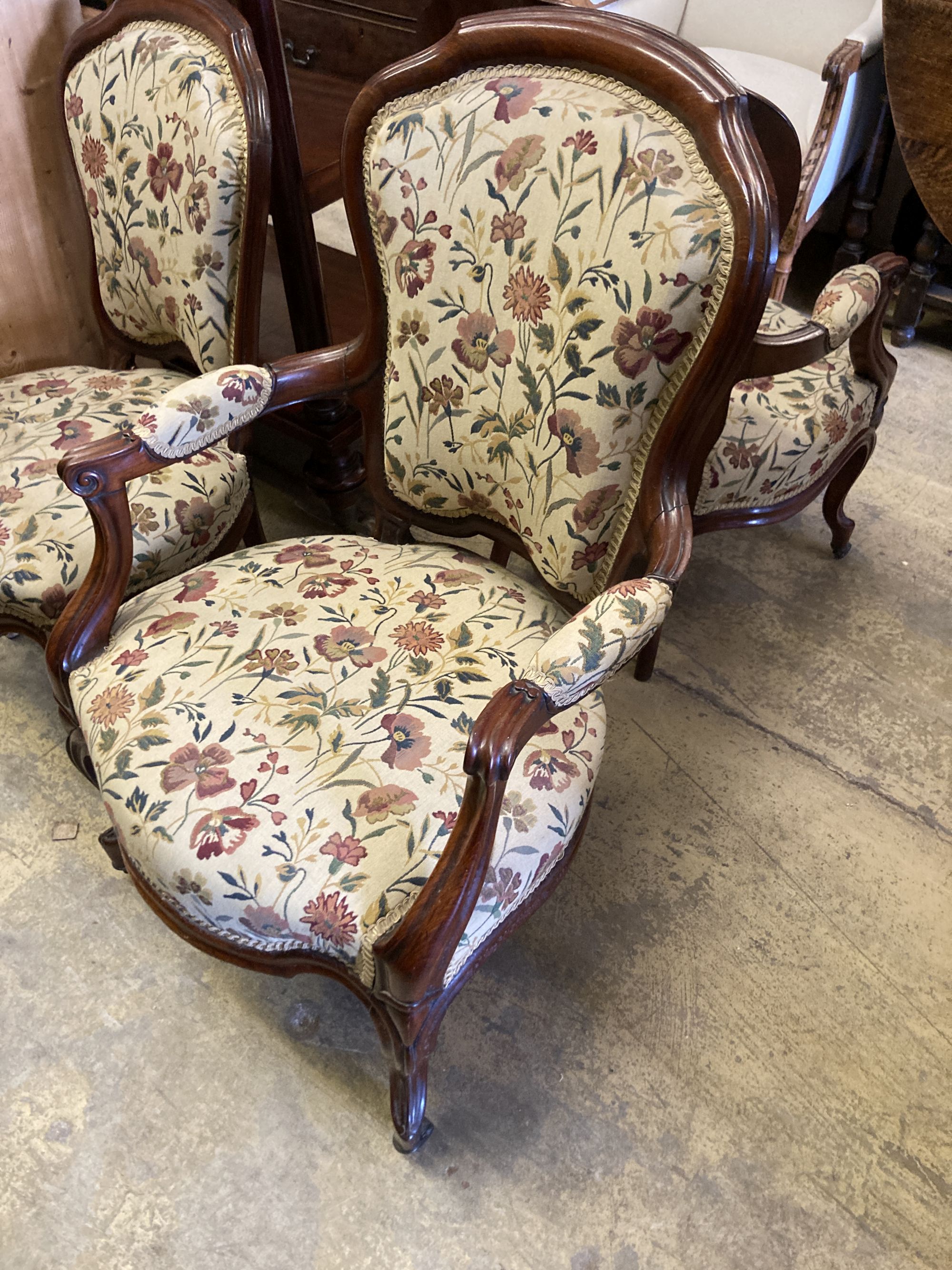 A pair of 19th century German mahogany armchairs and two side chairs